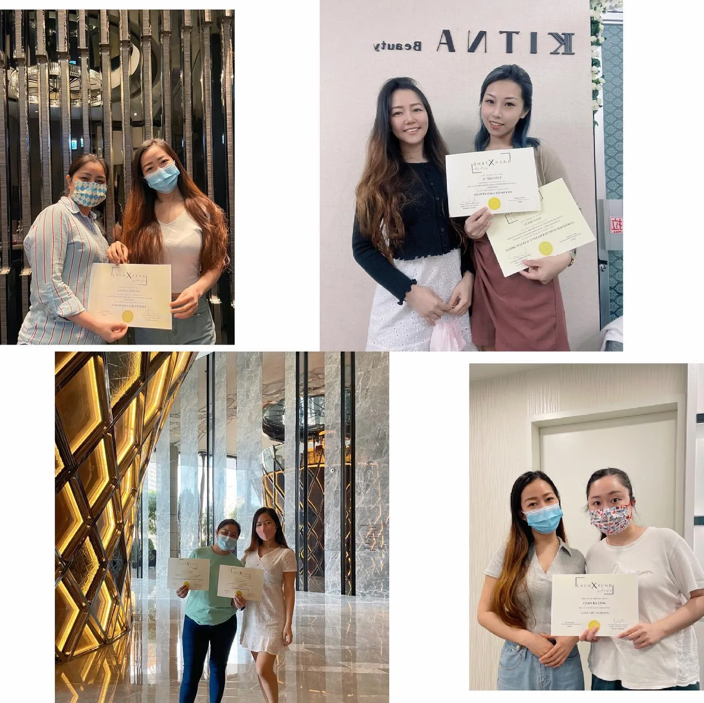 Graduates holding their certificates